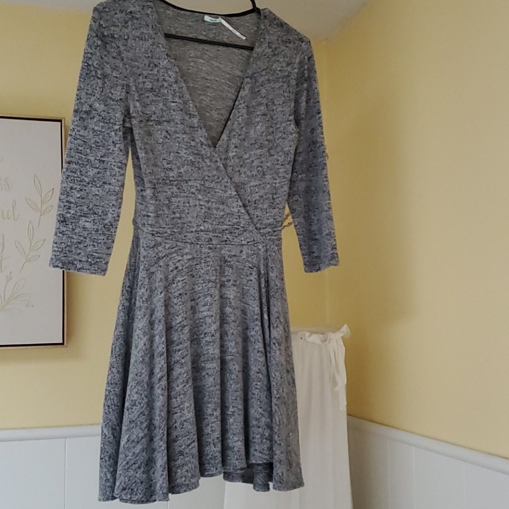 Grey mini dress with sleeves.
